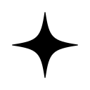 Glowing spark particle with a bright center and radiating lines on black background.
